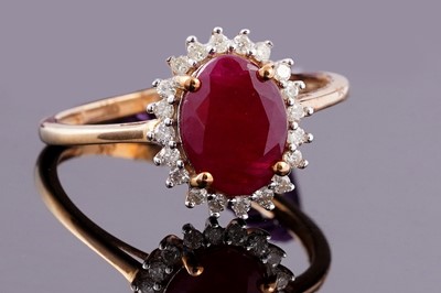 Lot 429 - A contemporary ruby and diamond ring