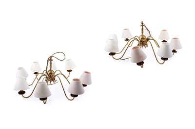 Lot 154 - A pair of brass eight-branch candelabra