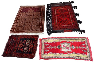 Lot 121 - A collection of four rugs