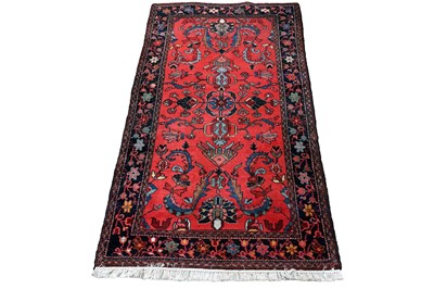 Lot 125 - A mid-20th Century hand-knotted Oushak rug