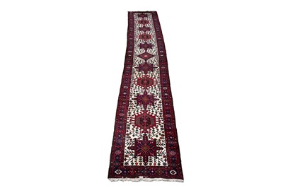 Lot 130 - A mid-Century hand-knotted Oushak-style runner