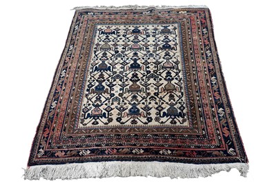 Lot 129 - A mid-20th Century hand-woven Beluch rug