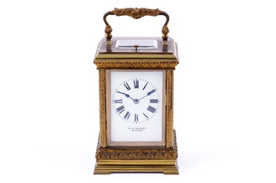 Lot 146 - Retailed by R. Stewart, Glasgow: an early 20th Century brass 8-day repeating carriage clock