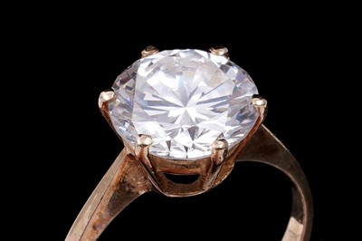 Lot 3 - A 9ct gold and CZ solitaire ring