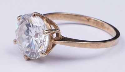 Lot 3 - A 9ct gold and CZ solitaire ring