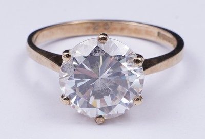 Lot 3 - A 9ct gold and CZ solitaire ring