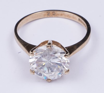 Lot 3 - A 9ct gold and CZ solitaire ring