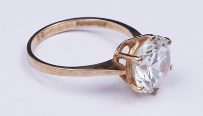Lot 3 - A 9ct gold and CZ solitaire ring