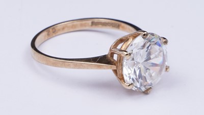 Lot 3 - A 9ct gold and CZ solitaire ring