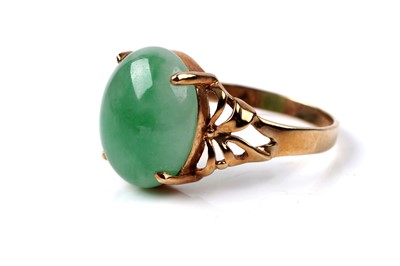 Lot 76 - A Chinese jade cabochon ring, and a tie pin
