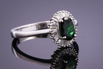Lot 447 - A Rhapsody Tsavorite garnet and diamond ring
