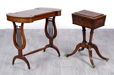 Lot 22 - A Regency and later games table; and a Regency flame mahogany and banded teapoy