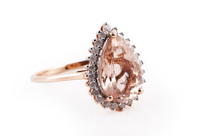 Lot 452 - A contemporary salmon morganite and diamond ring