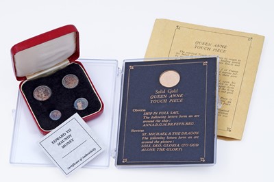 Lot 161 - A Queen Anne 9ct gold touch piece, replica issue; and a cased set of Edward VII silver maundy money