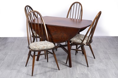 Lot 24 - An Ercol dining suite