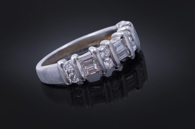 Lot 82 - A diamond half hoop eternity ring