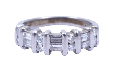 Lot 82 - A diamond half hoop eternity ring