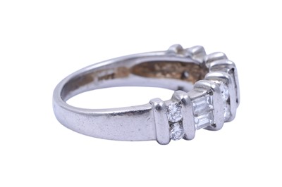 Lot 82 - A diamond half hoop eternity ring