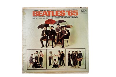 Lot A signed Beatles Record, autographed by John Lennon, Paul McCartney, George Harrison and Ringo Starr