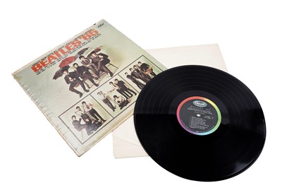 Lot A signed Beatles Record, autographed by John Lennon, Paul McCartney, George Harrison and Ringo Starr