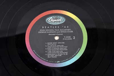 Lot A signed Beatles Record, autographed by John Lennon, Paul McCartney, George Harrison and Ringo Starr
