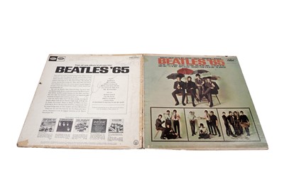 Lot A signed Beatles Record, autographed by John Lennon, Paul McCartney, George Harrison and Ringo Starr