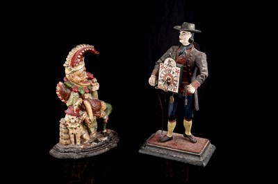 Lot 198 - A clockmaker figure; and a punch doorstop