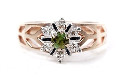 Lot 103 - A 1970s green tourmaline and diamond ring