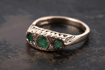Lot 104 - A Victorian Revival emerald and diamond ring