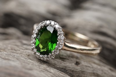 Lot 105 - A contemporary chrome diopside and diamond ring
