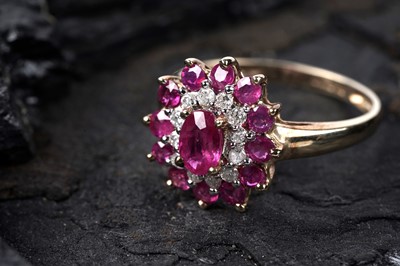 Lot 111 - A contemporary ruby and diamond cluster ring