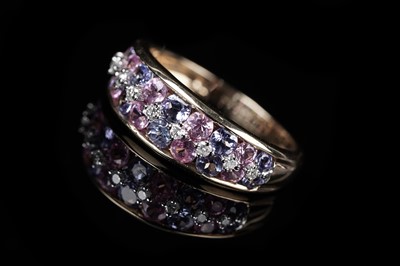 Lot A contemporary tanzanite, pink sapphire, and diamond half hoop eternity ring