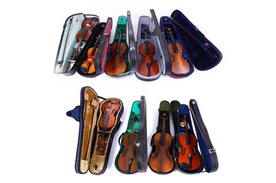Lot 516 - A collection of nine violins