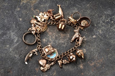 Lot 142 - A 9ct gold curb-link charm bracelet