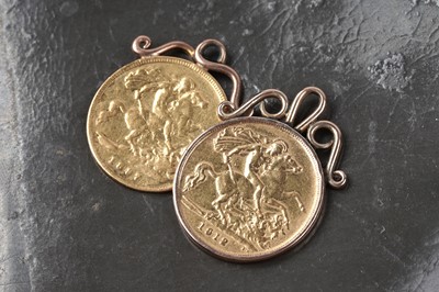 Lot 168 - Two gold half sovereign pendants