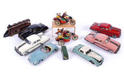 Lot 562 - A collection of mid-20th Century and later tinplate toys