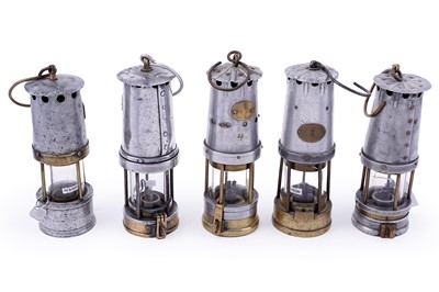 Lot 356 - A collection of five miner’s lamps