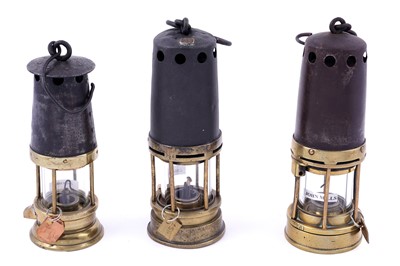 Lot 369 - Three safety lamps