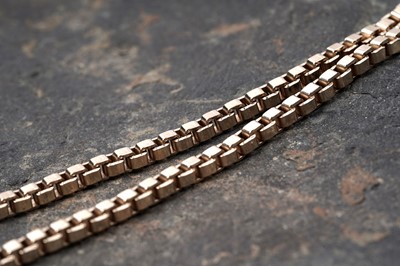 Lot 51 - A 9ct gold box link necklace with pendant locket