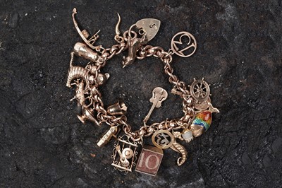 Lot 53 - A 9ct rose gold fancy-link charm bracelet