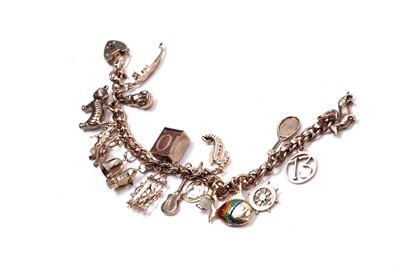 Lot 53 - A 9ct rose gold fancy-link charm bracelet