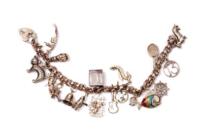 Lot 53 - A 9ct rose gold fancy-link charm bracelet
