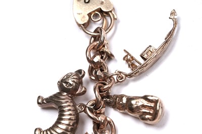 Lot 53 - A 9ct rose gold fancy-link charm bracelet