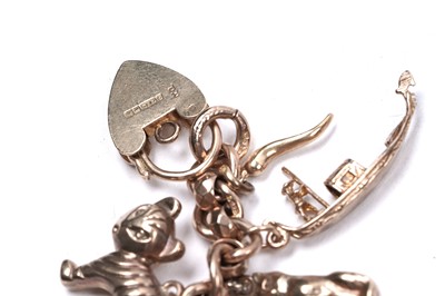 Lot 53 - A 9ct rose gold fancy-link charm bracelet