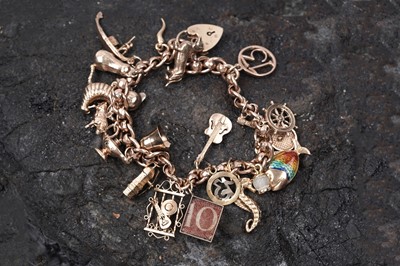 Lot 53 - A 9ct rose gold fancy-link charm bracelet