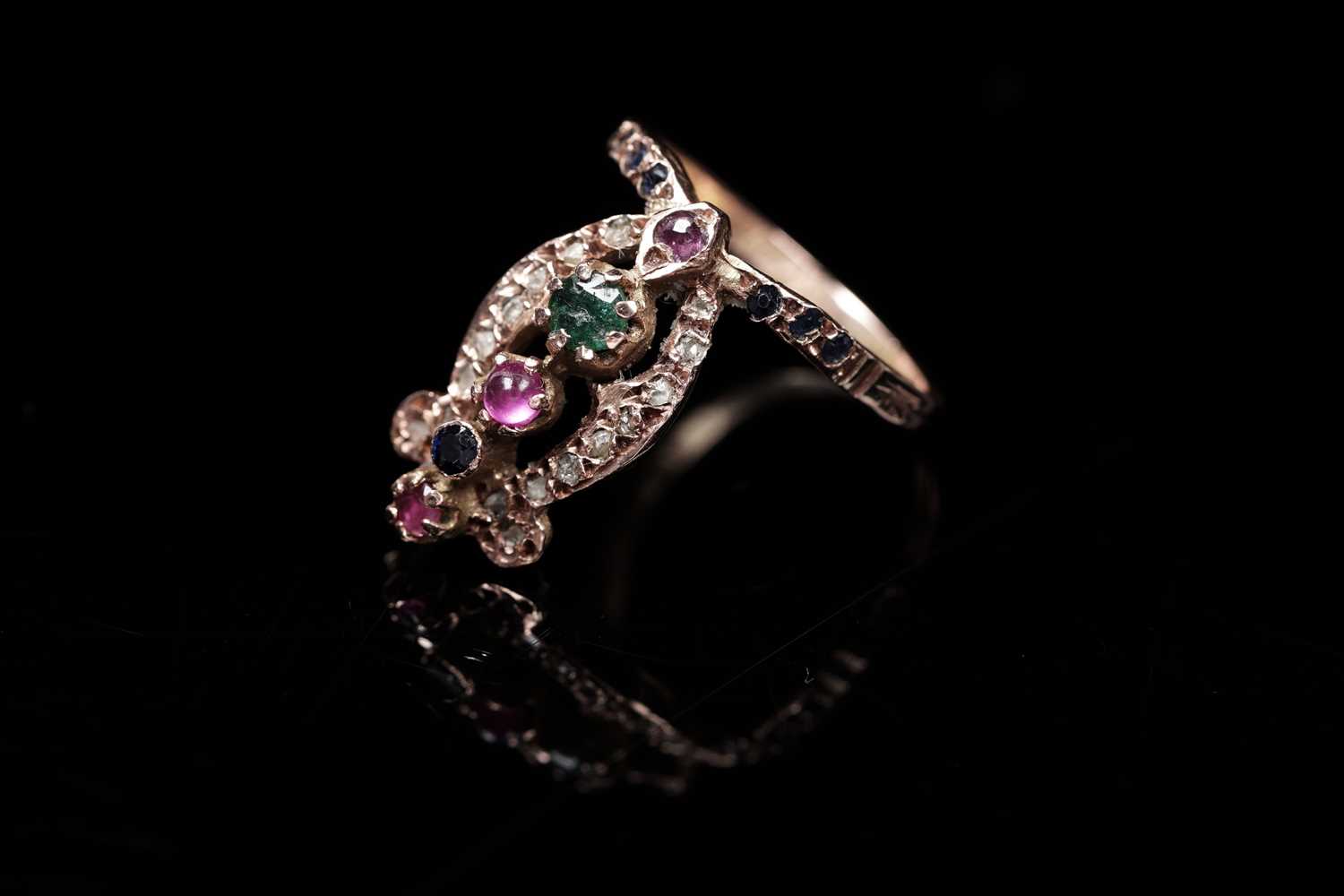 Lot 61 - An Egyptian ruby, sapphire, emerald, and diamond ring