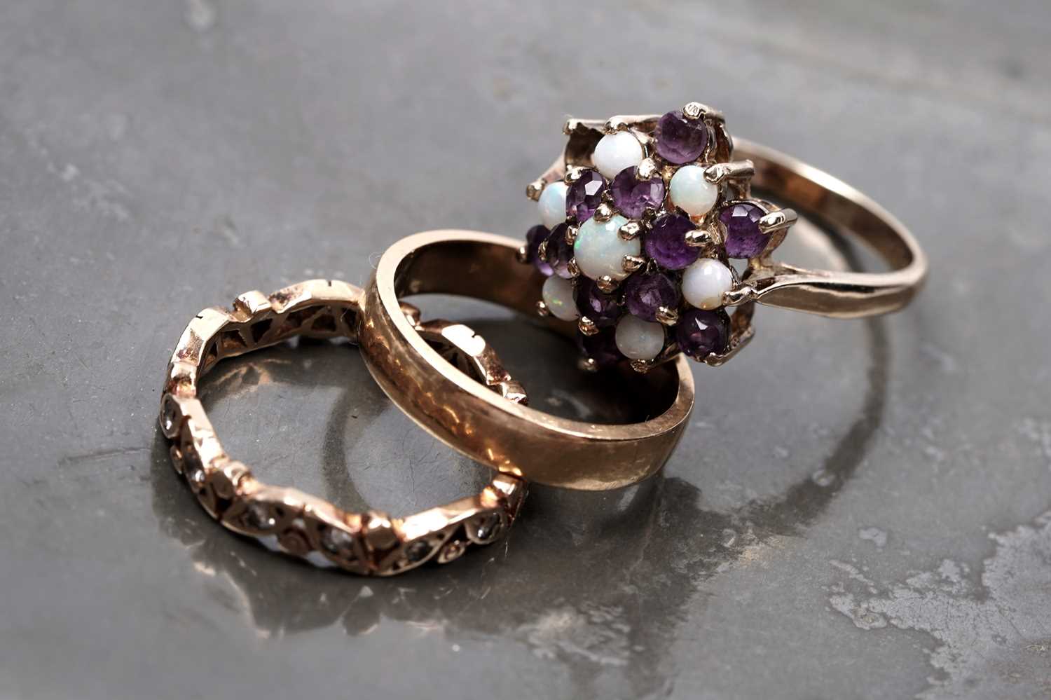 Lot 63 - Three rings, including an opal and amethyst cluster