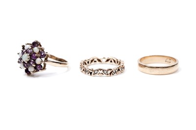 Lot 63 - Three rings, including an opal and amethyst cluster