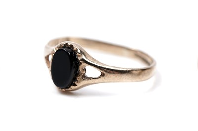 Lot 64 - Four 9ct gold rings, including a wishbone ring