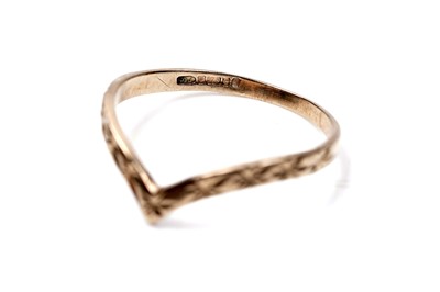 Lot 64 - Four 9ct gold rings, including a wishbone ring